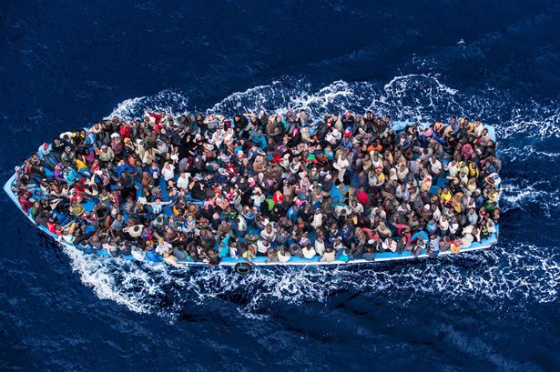 PAY-African-asylum-seekers-rescued-off-boats